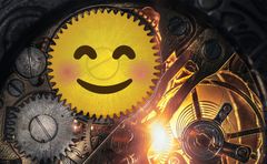 cogwheels in a machine with one cogwheel looking like a smiling emoji
